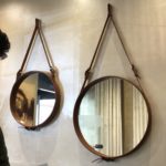 Leather framed round mirrors